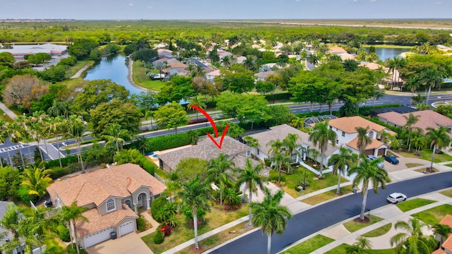 drone / aerial view with a water view