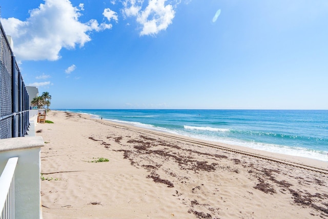 property view of water featuring a beach view