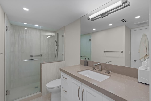 bathroom featuring tile flooring, an enclosed shower, toilet, and vanity