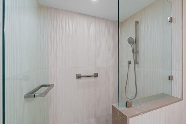 bathroom featuring tile floors, an enclosed shower, vanity, and toilet