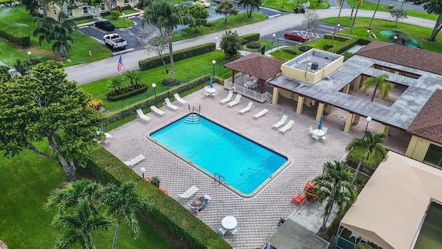 view of swimming pool featuring a patio area