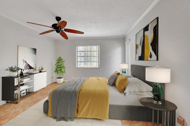 tiled bedroom featuring ceiling fan, ornamental molding, and a textured ceiling