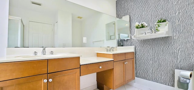 bathroom featuring tile floors and vanity