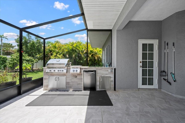 exterior space with a grill and exterior kitchen