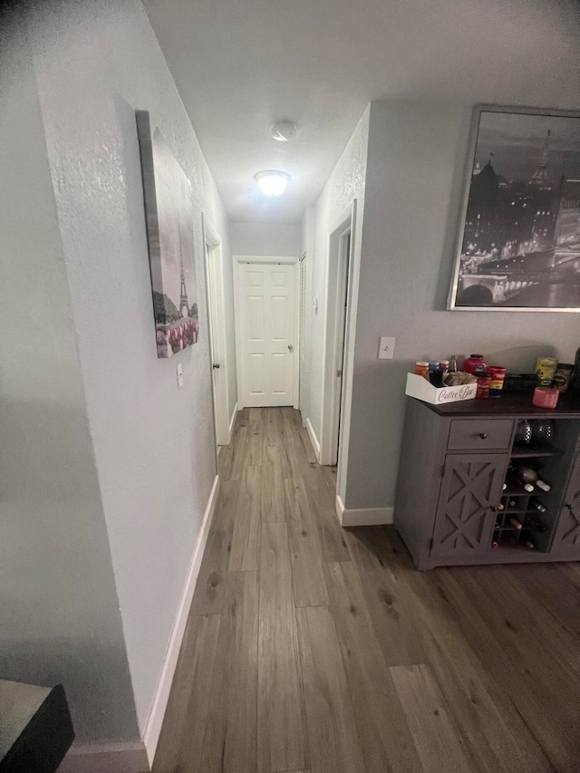 hallway featuring light hardwood / wood-style flooring