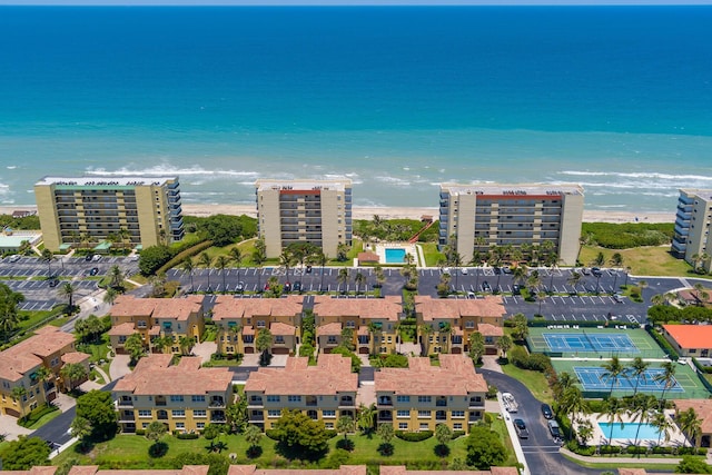 drone / aerial view with a view of the beach and a water view