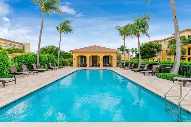 view of swimming pool featuring a patio area