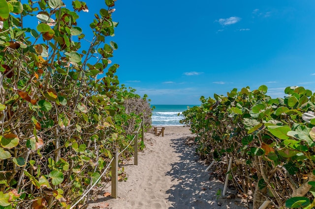 view of water feature with a beach view