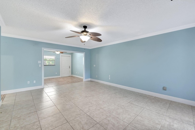 tiled spare room featuring crown molding, a textured ceiling, and ceiling fan