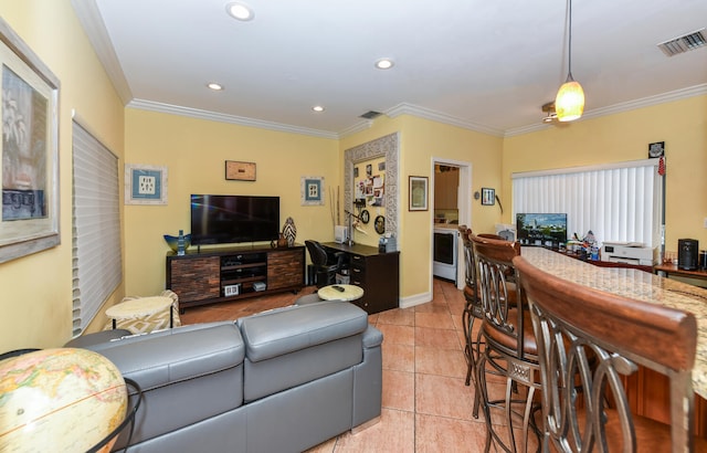 living room with light tile patterned floors and crown molding