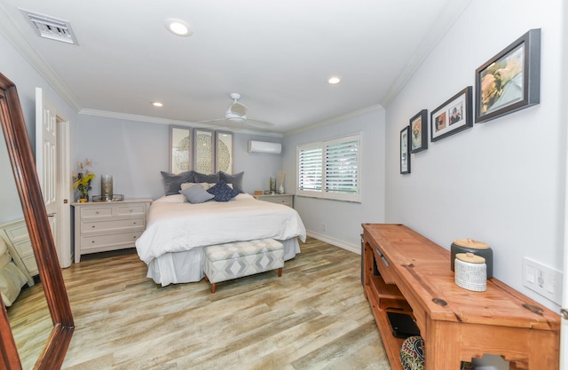 bedroom with a wall mounted air conditioner, ceiling fan, ornamental molding, and light hardwood / wood-style flooring