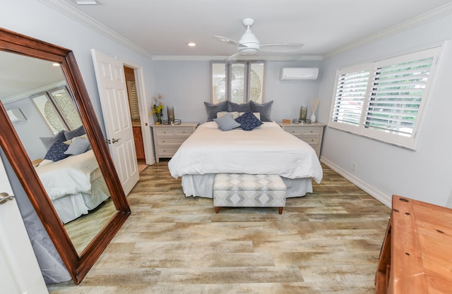 bedroom with an AC wall unit, ceiling fan, crown molding, and light wood-type flooring