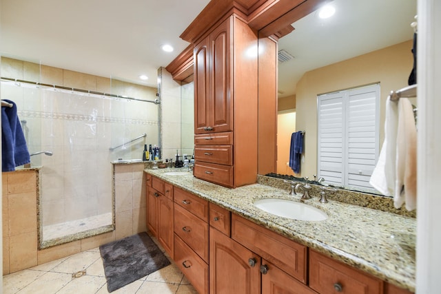 bathroom featuring tile patterned floors, vanity, tile walls, and a shower with shower curtain