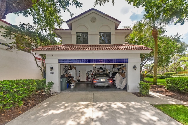 view of front of property featuring a garage