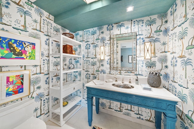 bathroom featuring tile patterned floors, vanity, and toilet