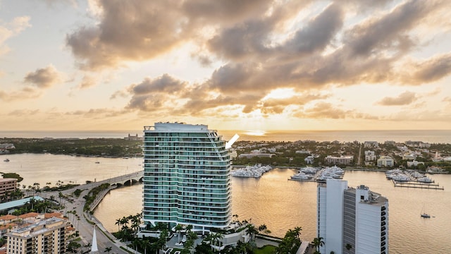 aerial view at dusk with a water view