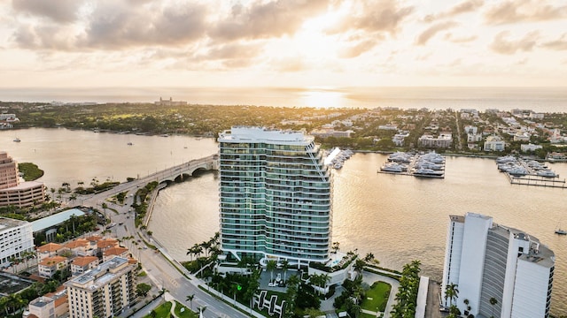 aerial view at dusk with a water view