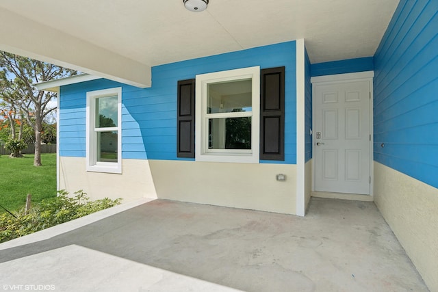 rear view of property with a yard, a patio area, and central air condition unit