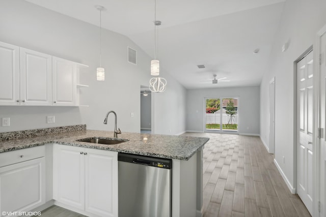 kitchen with sink, white cabinets, kitchen peninsula, and dishwasher