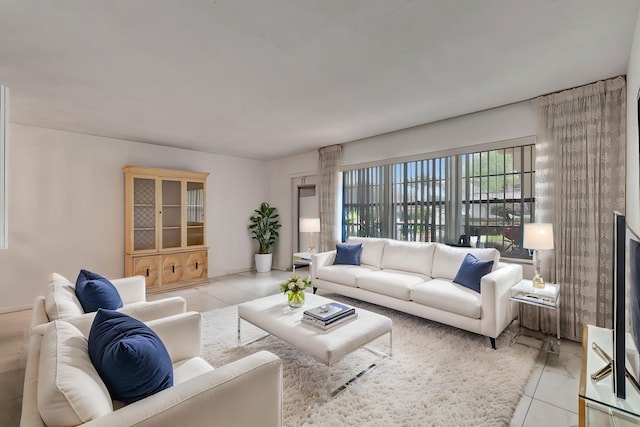 living room featuring light tile patterned floors