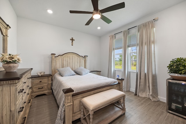 bedroom featuring ceiling fan and beverage cooler