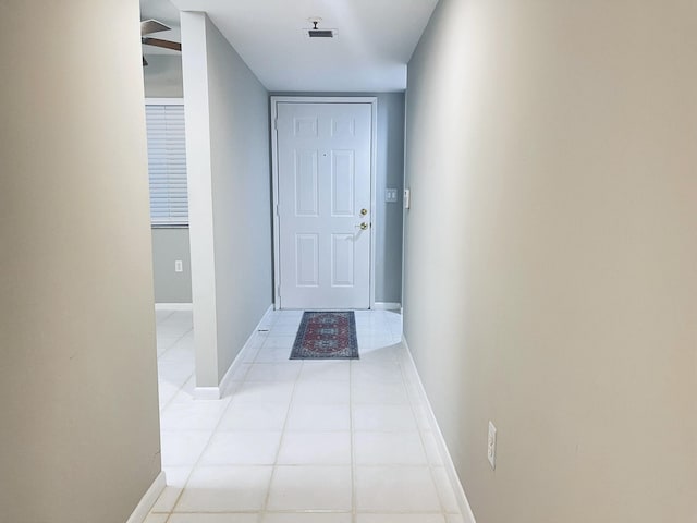 entryway featuring light tile patterned floors