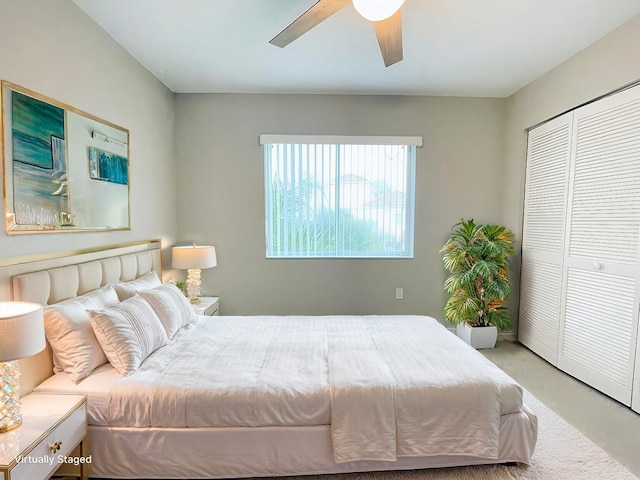 bedroom featuring carpet floors, a closet, and ceiling fan