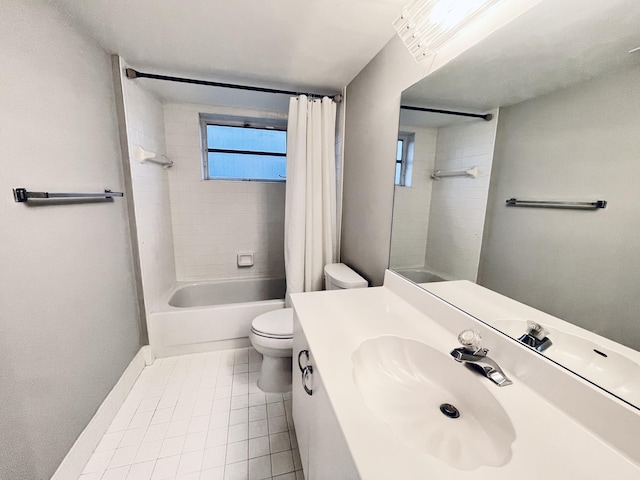 full bathroom featuring vanity, shower / bath combination with curtain, toilet, and a wealth of natural light