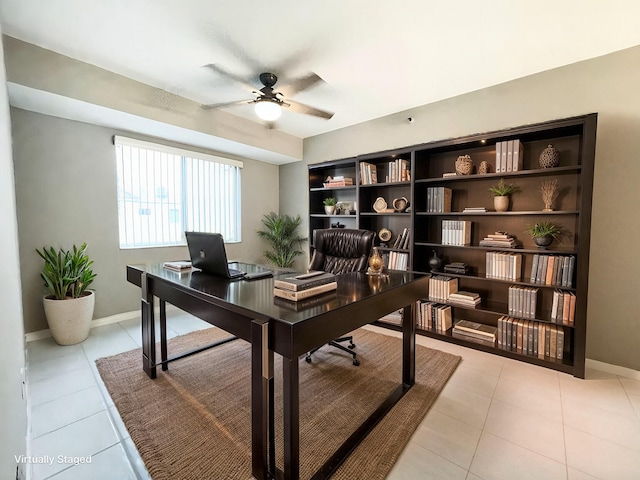 tiled office space with ceiling fan