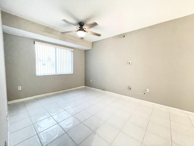 unfurnished room with ceiling fan