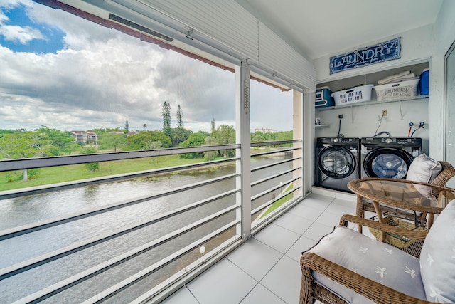 balcony featuring independent washer and dryer