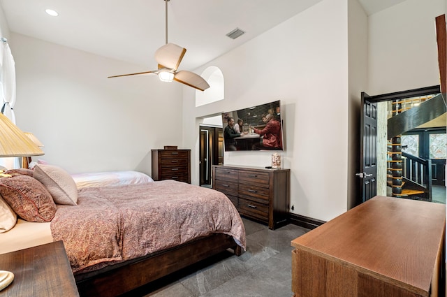 bedroom with ceiling fan and lofted ceiling