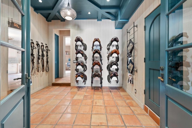 tiled foyer entrance with beam ceiling and coffered ceiling