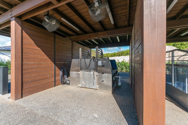 view of horse barn with ceiling fan