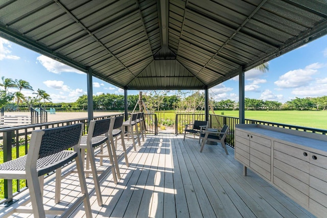 wooden deck with a yard