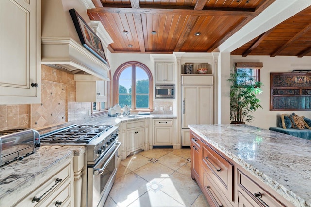 kitchen with custom exhaust hood, stainless steel appliances, backsplash, light tile floors, and wooden ceiling