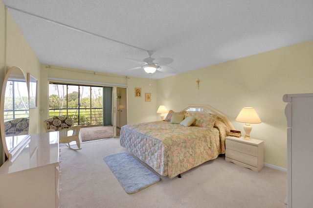 living room with light tile patterned floors, a textured ceiling, and ceiling fan