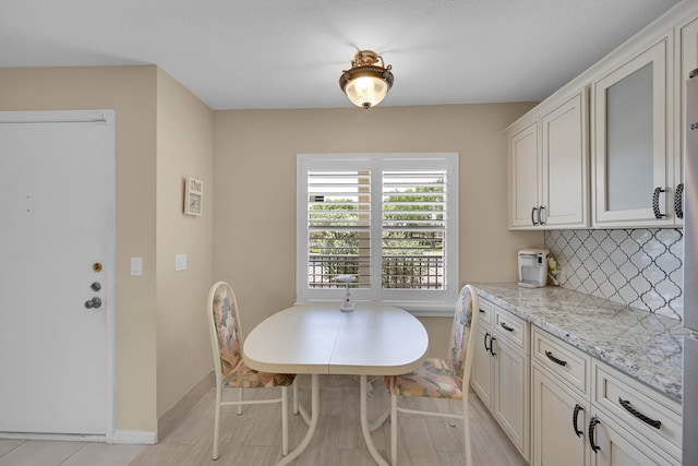 kitchen featuring kitchen peninsula, ceiling fan, sink, electric stove, and dishwasher