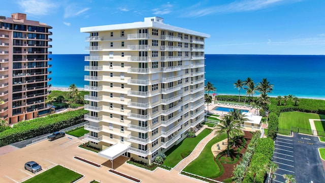 view of building exterior with a water view