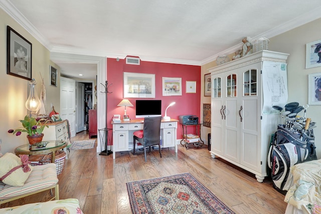 office featuring ornamental molding and hardwood / wood-style floors