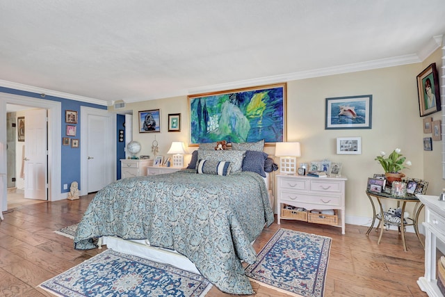 bedroom with crown molding and hardwood / wood-style floors