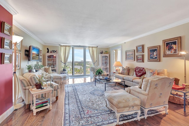 living room featuring crown molding and hardwood / wood-style floors