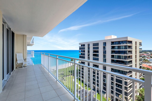 balcony featuring a water view