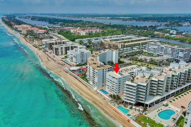 aerial view featuring a beach view and a water view