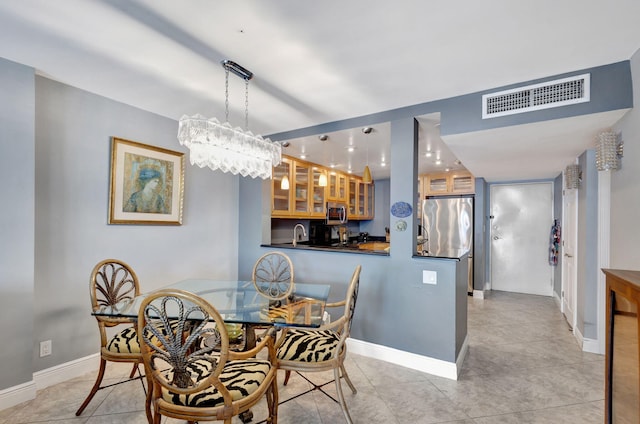 view of tiled dining space