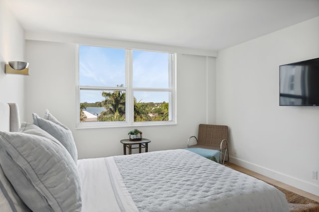 bedroom featuring hardwood / wood-style flooring