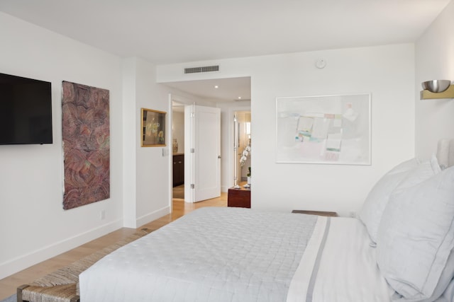 bedroom featuring light wood-type flooring