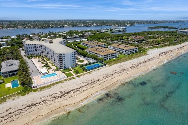 aerial view with a view of the beach and a water view