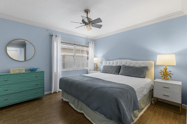 bedroom with ornamental molding, dark wood-type flooring, ceiling fan, and a textured ceiling