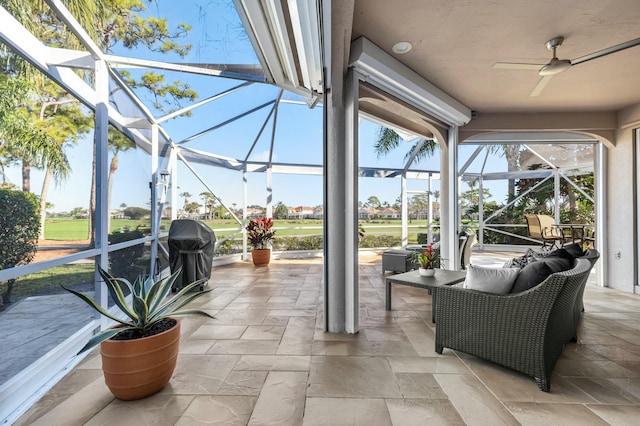 sunroom / solarium with ceiling fan